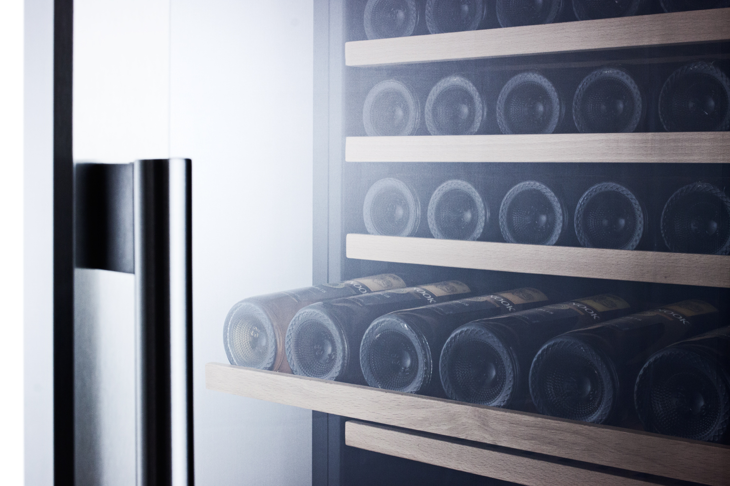 2-zone 160 bottle commercial wine cellar designed for the display and refrigeration of beverages, with glass door, digital thermostat, and black cabinet
